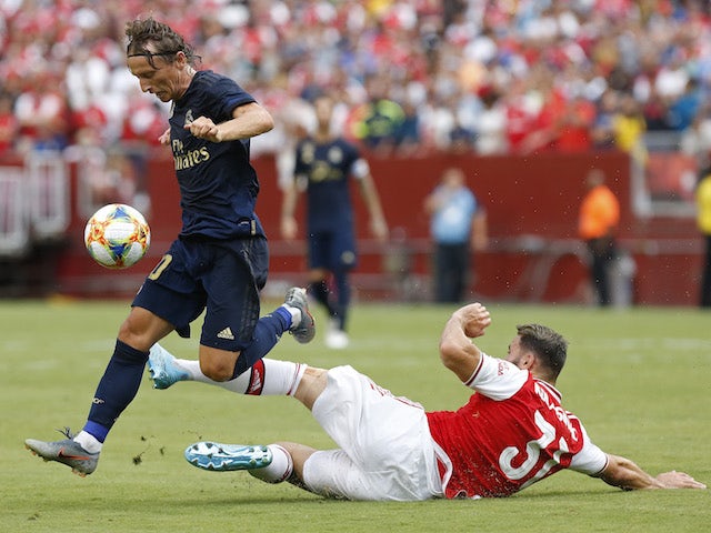 Arsenal's Sead Kolasinac in action with Real Madrid's Luka Modric in the International Champions Cup on July 23, 2019