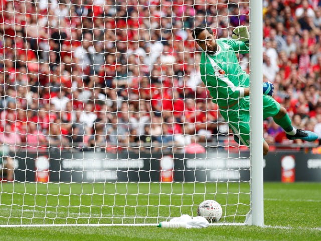 Liverpool's Virgil van Dijk sees a volley go close against Manchester City in the Community Shield on August 4, 2019.