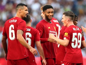 Harry Wilson is congratulated by his Liverpool teammates after scoring against Lyon on July 31, 2019