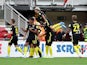 Ollie Watkins celebrates scoring with Brentford teammates on August 10, 2019