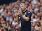Dean Smith watches on during the Premier League game between Tottenham Hotspur and Aston Villa on August 10, 2019