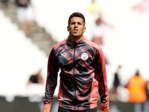 Guardiola refuses to rule out Cancelo exit