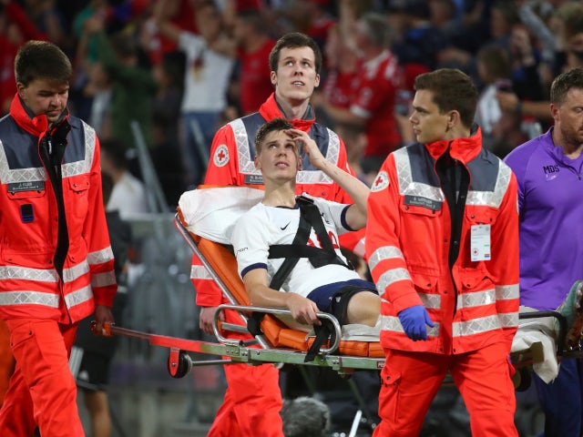 Tottenham Hotspur defender Juan Foyth is stretchered off during the Audi Cup final with Bayern Munich on July 31, 2019.