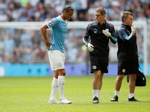 Manchester City's Leroy Sane hobbles off during the Community Shield on August 4, 2019.