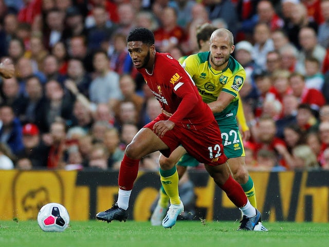 Liverpool's Joe Gomez in action with Norwich City's Teemu Pukki in the Premier League on August 9, 2019