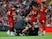 Liverpool goalkeeper Alisson Becker goes down injured against Norwich on August 9, 2019