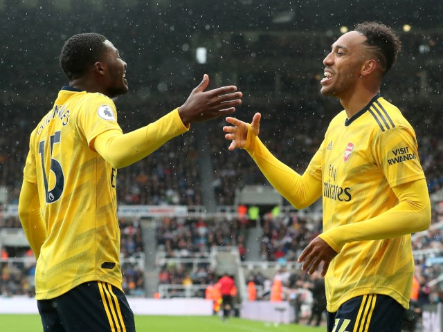 Ainsley Maitland-Niles and Pierre-Emerick Aubameyang celebrate Arsenal's opening goal against Newcastle United on August 11, 2019.