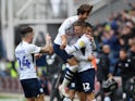 Preston North End's Paul Gallagher celebrates scoring their third goal with team mates on August 10, 2019
