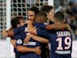 Paris Saint-Germain's Kylian Mbappe celebrates scoring their second goal with Edinson Cavani and team mates on August 11, 2019