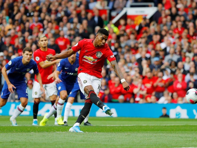 Marcus Rashford scores from the spot during the Premier League game between Manchester United and Chelsea on August 11, 2019