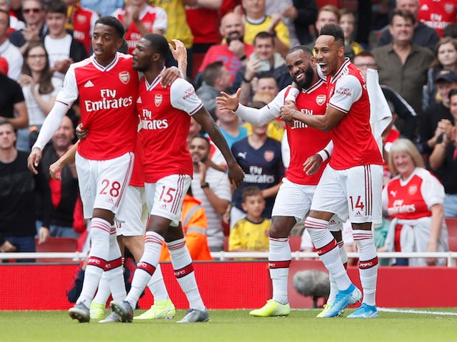 Arsenal players celebrate Alexandre Lacazette's goal against Burnley in the Premier League on August 17, 2019