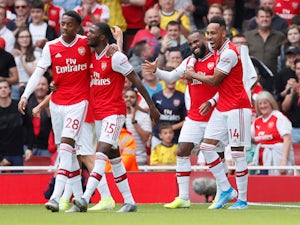Arsenal players celebrate Alexandre Lacazette's goal against Burnley in the Premier League on August 17, 2019