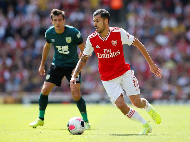 Arsenal's Dani Ceballos in action with Burnley's Jack Cork in the Premier League on August 17, 2019