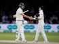 Australia's Pat Cummins and England's Rory Burns shake hands at the end of play as the second test ends in a draw on August 18, 2019