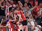 Athletic Bilbao's Aritz Aduriz celebrates scoring their first goal with team mates on August 16, 2019
