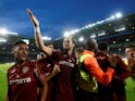 CFR Cluj's Billel Omrani celebrates scoring their second goal with team mates on August 13, 2019