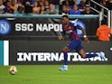 Barcelona defender Jean-Clair Todibo (6) chases the ball during the second half of the United States La Liga-Serie A Cup Tour soccer match against Napoli at Hard Rock Stadium in August 2019