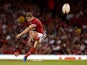 Wales' Leigh Halfpenny takes a successful penalty kick against England on August 17, 2019