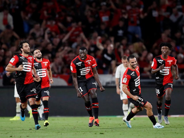 Stade Rennes' M'Baye Niang celebrates scoring their first goal with teammates on August 18, 2019