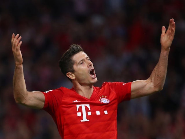 Robert Lewandowski scores twice as Bayern Munich held by Hertha Berlin