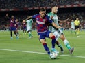 Barcelona's Carles Perez in action with Real Betis's Alfonso Pedraza in La Liga on August 25, 2019
