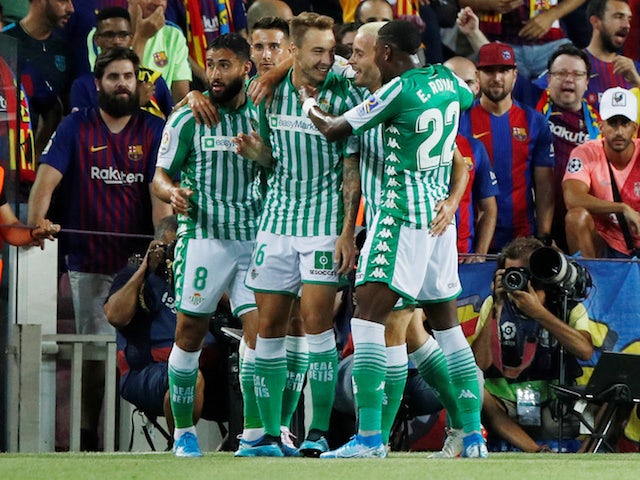 Real Betis players celebrate Nabil Fekir's goal against Barcelona in La Liga on August 25, 2019