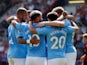 Manchester City's Sergio Aguero celebrates scoring their first goal with team mates on August 25, 2019