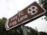 Street sign pointing to Gigg Lane, home of Bury