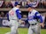 Chicago Cubs first baseman Anthony Rizzo (44) high fives third base coach Brian Butterfield (55) after hitting a home run in the fifth inning against the Pittsburgh Pirates at BB&T Ballpark at Historic Bowman Field.