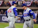 Chicago Cubs first baseman Anthony Rizzo (44) high fives third base coach Brian Butterfield (55) after hitting a home run in the fifth inning against the Pittsburgh Pirates at BB&T Ballpark at Historic Bowman Field.