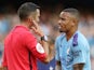 Manchester City's Gabriel Jesus remonstrates with referee Michael Oliver after the match on August 17, 2019