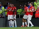 Manchester United's Anthony Martial celebrates scoring their first goal with teammates on August 19, 2019