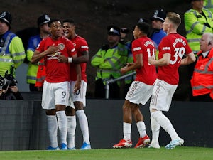 Manchester United's Anthony Martial celebrates scoring their first goal with teammates on August 19, 2019