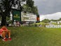A view of a leader board announcing that play has been suspended during the third round of the Tour Championship golf tournament at East Lake Golf Club on August 24, 2019
