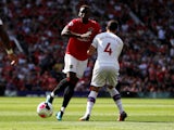 Manchester United's Paul Pogba in action with Crystal Palace's Luka Milivojevic in the Premier League on August 24, 2019