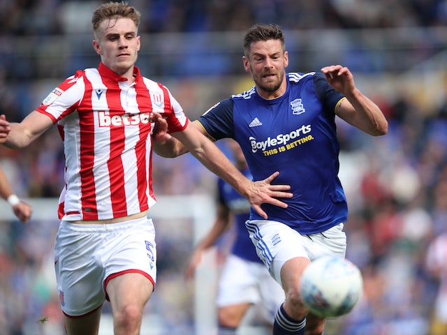 Stoke's Liam Lindsay and Birmingham's Lukas Jutkiewicz in action on August 31, 2019