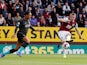 Virgil van Dijk and Chris Wood in action during the Premier League game between Burnley and Liverpool on August 31, 2019