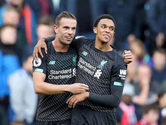 Trent Alexander-Arnold celebrates scoring with Jordan Henderson during the Premier League game between Burnley and Liverpool on August 31, 2019