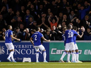Everton score two late goals to survive Lincoln scare