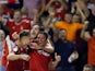 Nottingham Forest's Joao Carvalho celebrates scoring their third goal with team mates on August 27, 2019