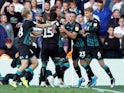 Wayne Routledge celebrates scoring late for Swansea City on August 31, 2019
