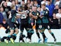 Wayne Routledge celebrates scoring late for Swansea City on August 31, 2019