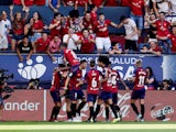 Osasuna players celebrate Roberto Torres's goal against Barcelona in La Liga on August 31, 2019