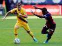 Barcelona's Carles Perez in action with Osasuna's Pervis Estupinan in La Liga on August 31, 2019