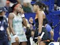 Naomi Osaka of Japan (R) talks with Coco Gauff of the United States (L) after their match in the third round on day six of the 2019 U.S. Open tennis tournament at USTA Billie Jean King National Tennis Center