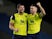 Oxford United's John Mousinho celebrates winning the penalty shootout with Jamie Mackie on August 27, 2019