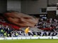Legia Warsaw fans unfurl Pope John Paul II banner at Ibrox