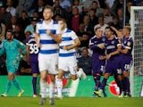 Portsmouth's John Marquis celebrates after scoring their first goal from the penalty spot on August 28, 2019