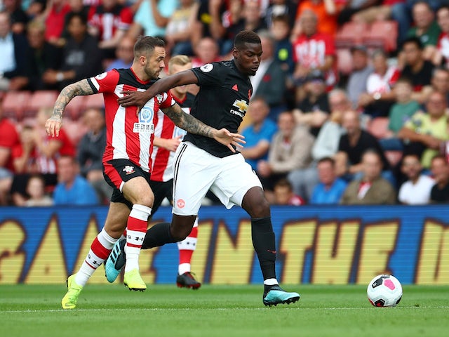 Manchester United midfielder Paul Pogba in action with Southampton's Danny Ings in the Premier League on August 31, 2019