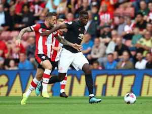 Manchester United midfielder Paul Pogba in action with Southampton's Danny Ings in the Premier League on August 31, 2019
